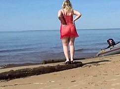 Wow, juicy ass milf struts beach in big natural tits glory!