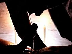 Candlelight glows as she delivers romantic deep blowjob at the party