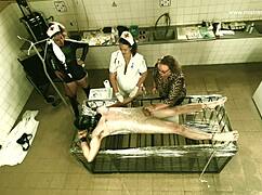 Nurse mistress april electrifies rosie slave's pussy piercing in hospital bdsm