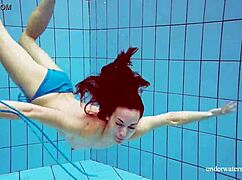 Martina teases in blue bikini her tight pussy flashes underwater at pool beach shower