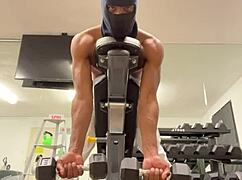 athletic bodybuilder flexes biceps to hoist ladies during outdoor workouts