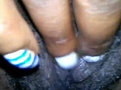 Ebony Jessica Grabbit teases hairy pussy with rabbit toy in highlights.